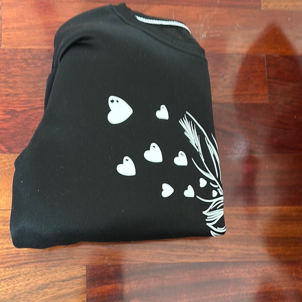 Black Sweatshirt with White Heart and Feather Design